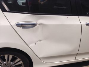Ding and dent in car door