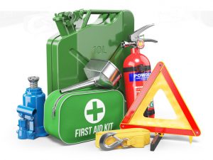 emergency car kit including jerrycan, funnel, fire extinguisher, first aid kit, tow rope, jack and emergency warning triangle. objects isolated on white background. 3d