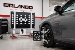ADAS calibration equipment being used on a modern vehicle after collision repair at Orlando Auto Body