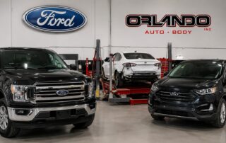 Ford Certified collision repair facility with Ford vehicles inside Orlando Auto Body repair shop